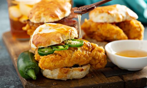 Breakfast biscuit sandwiches with fried chicken, traditional southern food